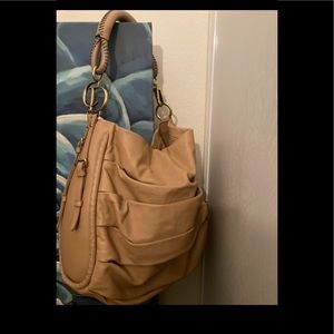 Beautiful Dior bag in cream looks very clean and new